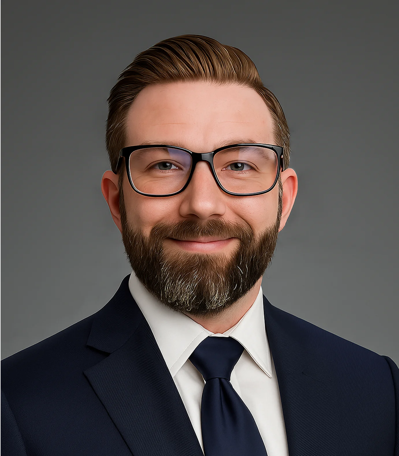 Professional man with glasses and beard in suit and tie.
