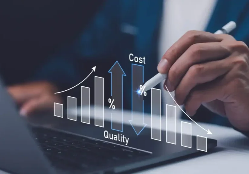 Hand pointing at a rising cost and quality graph on a digital interface.