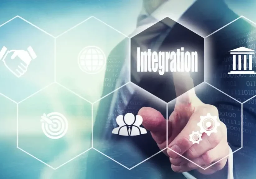A hand pointing to a digital hexagon labeled 'Integration' with technology icons.