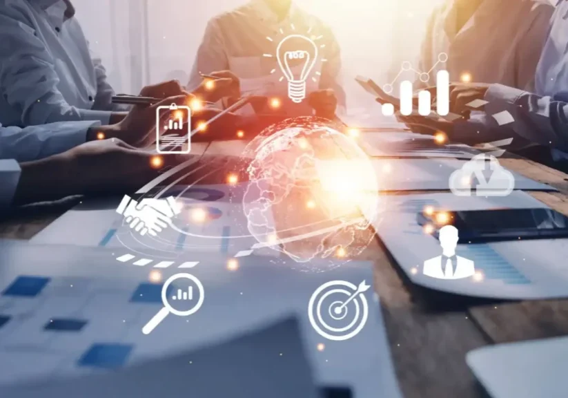 Business meeting with global digital technology icons overlay.
